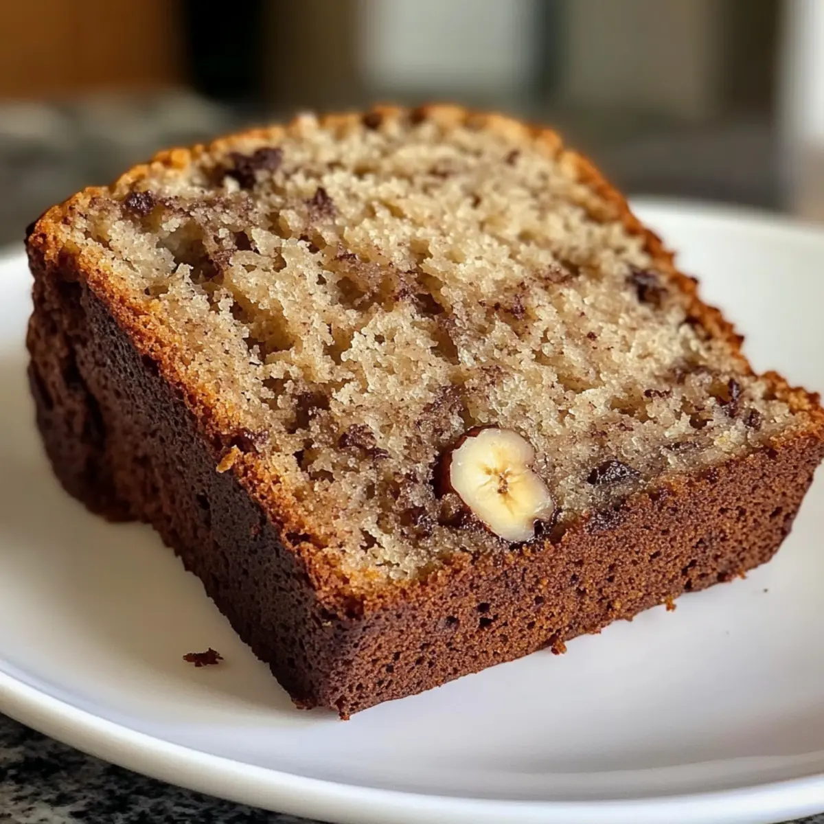 Einfache Bananenbrot Rezept Zutaten: - 3 reife Bananen - 75 g geschmolzene Butter - 200 g Zucker - 1 Ei - 1 Teelöffel Vanilleextrakt - 1 Teelöffel Backpulver - Prise Salz - 190 g Mehl Anleitung: 1. Ofen auf 175°C vorheizen. 2. Bananen in einer Schüssel zerdrücken. 3. Geschmolzene Butter hinzufügen und gut vermengen. 4. Zucker, Ei und Vanilleextrakt einrühren. 5. Backpulver und Salz hinzufügen. 6. Mehl unterheben. 7. In eine gefettete Kastenform gießen. 8. 60 Minuten backen oder bis ein Zahnstocher sauber herauskommt. 9. Abkühlen lassen und servieren.
